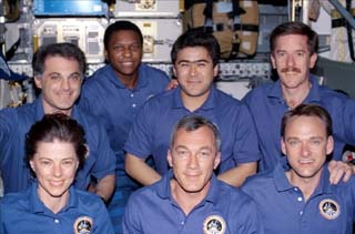 Crew assembles on the middeck of the Endeavour for a group portrait 